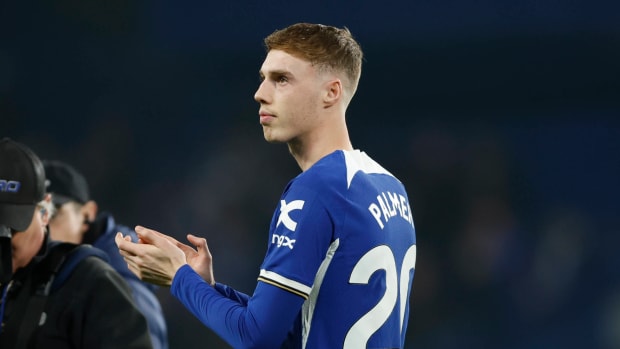 Cole Palmer pictured applauding the fans at Stamford Bridge after Chelsea beat Newcastle United 3-2 in the Premier League in March 2024